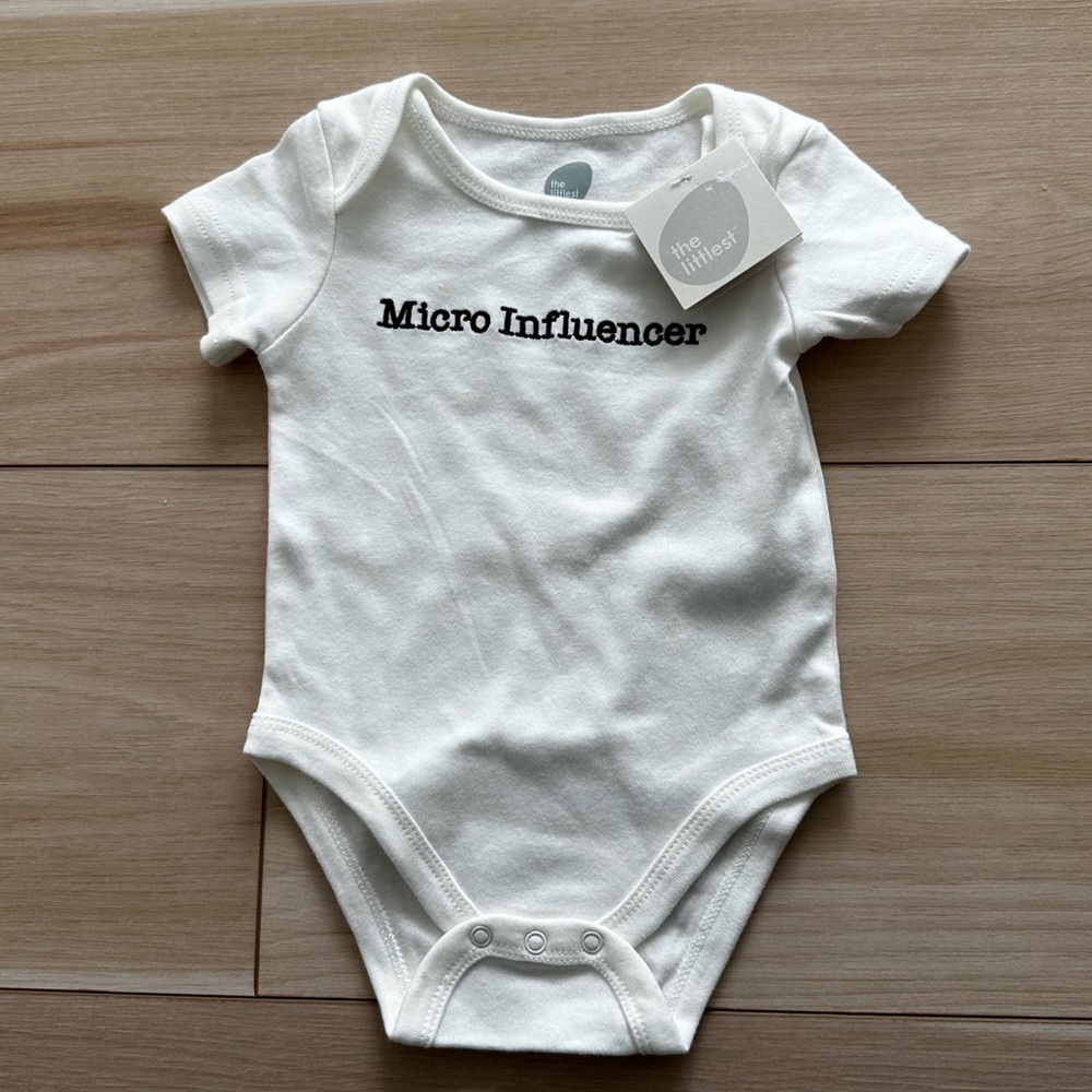 NWT ‘Micro Influencer’ White Baby Bodysuit
